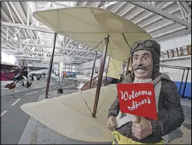  ??  ?? A pilot with a smiling face welcomes visitors to the museum.