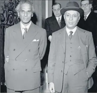  ?? GETTY IMAGES ?? VK Krishna Menon and Jawaharlal Nehru leave 10 Downing Street in London after the morning session of the Commonweal­th Prime Ministers' Conference on February 1, 1955