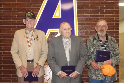  ?? Submitted photo ?? ■ The Ashdown School District recognized James Bradshaw, left, Bily Wayne Adkison and William Booth Jr., right, with a special ceremony during an Ashdown Board meeting on Veterans Day.