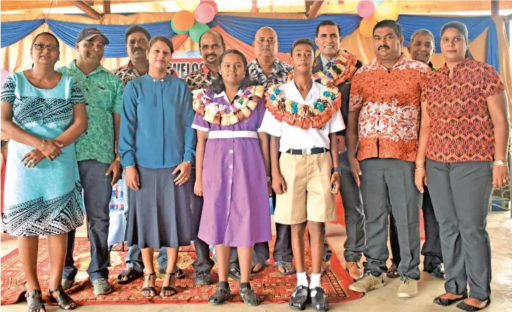  ?? Photo: Nicolette Chambers ?? A.D. Patel Memorial Primary School head girl Krysha Krishna (front left) and head boy Prayan Karan (front right) with the chief guest, Director Primary Education, Hem Chand (also with garland) at the school on February 14, 2019.