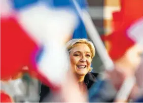  ?? THE ASSOCIATED PRESS ?? French presidenti­al candidate Marine Le Pen addresses a crowd in Ennemain, France, on Thursday.