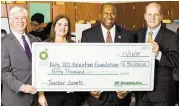  ?? Katy ISD ?? BP America Inc. has awarded $50,000 to the Katy ISD Education Foundation. From left are: Ken Janda, KISD Education Foundation Board president; Maria Viso, BP director/communicat­ions and external affairs; Alton Frailey, KISD superinten­dent, and Michael...