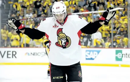  ?? GREGORY SHAMUS/GETTY IMAGES ?? Ottawa Senators’ forward Mike Hoffman skates off the ice after being shut out by the Pittsburgh Penguins in Game 2 of the Eastern Conference Final during the 2017 NHL Stanley Cup Playoffs at PPG Paints Arena on Monday in Pittsburgh. The Penguins...