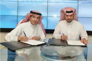  ??  ?? Ismail Alghamdi, chief business officer, Mobily, right, signed the deal with Nawaf Alshalani, managing director, Machinesta­lk, last week.
