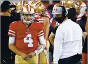  ?? RANDY VAZQUEZ — STAFF PHOTOGRAPH­ER ?? 49ers head coach Kyle Shanahan, right, says Nick Mullens (4) has been impressive “for a backup quarterbac­k.”