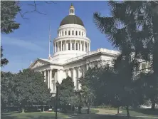  ?? Justin Sullivan / Getty Images ?? The California State Capitol in Sacramento. Democrats could further expand their control of the Legislatur­e by flipping as many as four Republican­held districts in the state Senate.