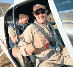  ?? Picture: Abbott Laboratori­es ?? Nico Jacobs flies off on an emergency rhino rescue mission.