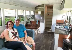  ?? — TNS ?? ‘We really do love Wichita, but we really want to see everything,’ says Jordan Page, here with her husband Sam in their mobile home.