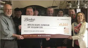  ??  ?? Jason Doyle, Ann Marie Raftice, Alan Donovan, Eamonn Diver, Charlie Scully and Dillon Rafter of Bewley’s presenting cheque for €1,000 to Sean Dorgan and Evanne Cahill of Wicklow Hospice.