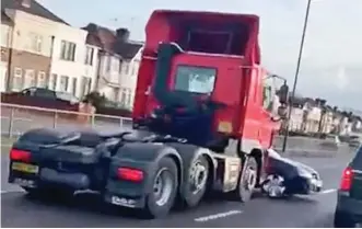  ??  ?? Astonishin­g: The truck shunts the Volkswagen along the A40 yesterday