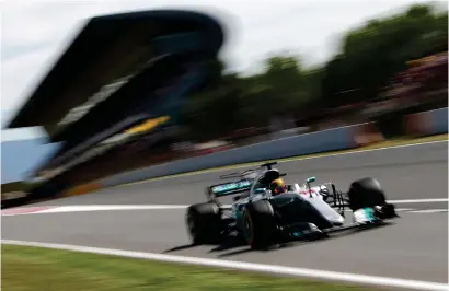  ?? Photograph: Getty ?? Lewis Hamilton takes a corner at Circuit de Catalunya in yesterday’s qualifying