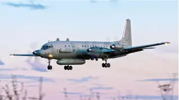  ?? — AFP photos ?? Photo shows an Russian IL-20M (Ilyushin 20m) plane landing at an unknown location.