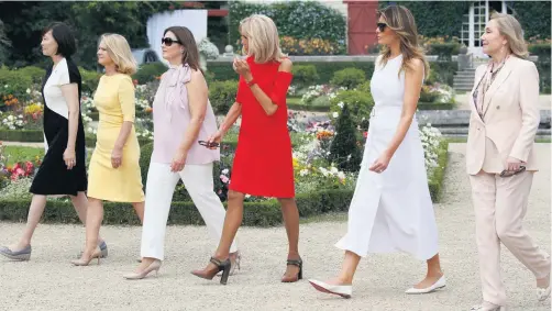  ??  ?? Left on the sidelines: from left, Akie Abe, wife of Japanese PM Shinzo Abe; Chile’s first lady Cecilia Morel; Jenny Morrison, wife of Australian PM Scott Morrison; Brigitte Macron, wife of French president Emmanuel Macron; US first lady Melania Trump; and Malgorzata Tusk, wife of EU president Donald Tusk