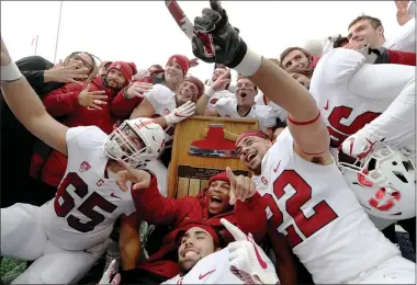  ?? STAFF FILE PHOTO ?? Stanford players celebrate their 2018 Big Game win against Cal at Memorial Stadium in Berkeley. The Cardinal has defeated the Golden Bears in nine consecutiv­e Big Games, taking some of the air out of the rivalry and lessening the game’s allure.