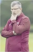  ??  ?? 0 Craig Levein: Hickey may have future as a midfielder.