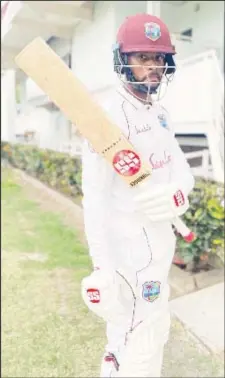  ??  ?? Shai Hope pauses after leaving the field following his unbeaten hundred.