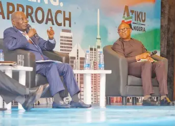  ??  ?? Atiku Abubakar and Peter Obi at the interactiv­e session.