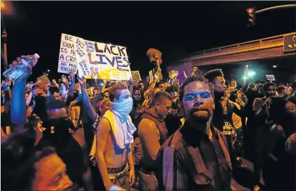  ?? Picture: REUTERS ?? DON’T SHOOT: Protesters gather on Wednesday to protest the fatal shooting of an unarmed black man on Tuesday by officers in El Cajon, California