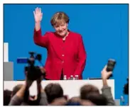  ?? (Photo EPA) ?? Angela Merkel, a été élue, hier, à la tête de la CDU avec  ,  % des voix pour conduire les élections législativ­es de .