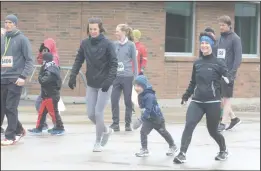  ?? NEWS PHOTO MO CRANKER ?? Hatters warm up before the 40th annual Rattler Run outside of Medicine Hat College April 26, 2019.