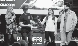  ?? DAVID BECKER/GETTY IMAGES ?? From left, Kim Coon, Noah Gragson, Hailie Deegan and Daryl Motte appear on stage at the Monster Energy NASCAR Cup Series Experience last week during the NASCAR Playoffs Party at the Fremont Street Experience in Las Vegas, Nevada.