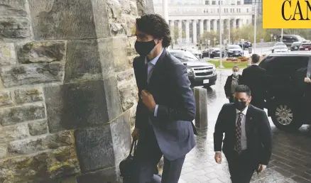  ?? ADRIAN WYLD/THE CANADIAN PRESS ?? Prime Minister Justin Trudeau arrives at the House of Commons in Ottawa on Monday, ahead of the first federal budget in more than two years.