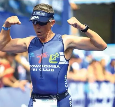  ?? PHOTO: CONTRIBUTE­D ?? NEW CHALLENGE: Julian Lancaster-Smith finishes the Noosa Triathlon.