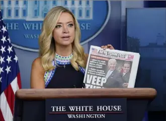  ?? Patrick Semansky/Associated Press ?? White House press secretary Kayleigh McEnany displays a copy of the New York Post as she speaks during a news conference at the White House on Sept. 24.