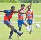  ?? Picture: REINAL CHAND ?? Northpole’s Ravnesh Singh, middle, defends against Yalalevu’s Malakai Kaiwalu during their match at Lawaqa Park in Sigatoka last week.