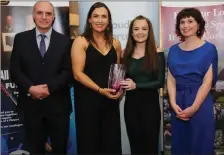  ??  ?? Bríd O’Sullivan presenting a Youth Sports Award to Amy Whelan of Awbeg and District Community Games with committee member Sean Dilworth and Sinead O’Connor, AIB, Mallow (sponsors).