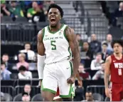  ?? DAVID BECKER — THE ASSOCIATED PRESS ?? Oregon’s Jermaine Couisnard (5) reacts after hitting a 3-pointer against Washington State in Thursday’s game.
