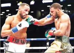  ?? AFP ?? James DeGale (left) and Badou Jack fight in their super-middleweig­ht unificatio­n bout at the Barclays Center in New York on Saturday.