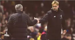  ??  ?? Manchester United’s Jose Mourinho and Liverpool’s Jürgen Klopp