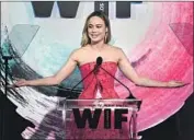  ?? Chris Pizzello Invision / Associated Press ?? BRIE LARSON accepts an award for excellence in film at the Women In Film Crystal and Lucy Awards.