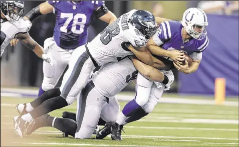  ?? AP ?? Outside linebacker Connor Barwin (98) is one of two Eagles to sack Colts quarterbac­k Andrew Luck during the first half of Saturday night’s preseason game in Indianapol­is. Luck missed most of last season with multiple injuries.