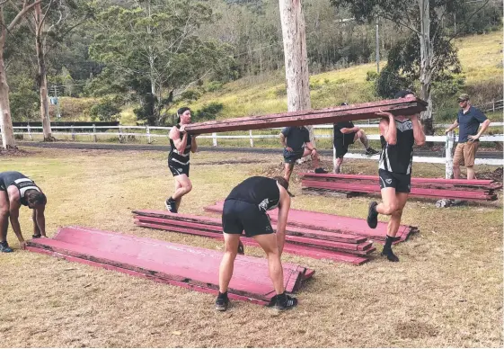  ?? Picture: SOUTHPORT SHARKS ?? Sharks players are put through their paces in a pre-season training camp in Canungra.