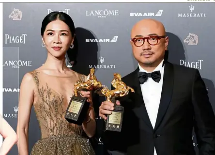  ??  ?? Hsieh (left) and Xu with their awards for Best Actress and Best Actor respective­ly at the 55th Golden Horse Awards on Saturday. — Reuters