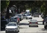  ?? MONTEREY HERALD FILE ?? A Toyota Prius parallel parks on Dolores Street in downtown Carmel.