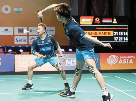  ?? ?? Prized scalp: aaron Chia and Soh Wooi yik oust taiwan’s Olympic champions Lee yang-wang Chi-lin to reach the thailand Open semi-finals.