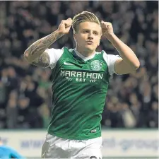  ??  ?? Jason Cummings scored and provided in Hibs’ derby win