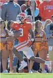  ?? ASSOCIATED PRESS ?? BIG THREAT: Running back Travis Etienne and Clemson won’t have an easy night against the BC defense.