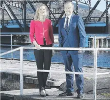  ??  ?? BUILDING BRIDGES: Rebecca White and Bill Shorten in front of the Bridgewate­r Bridge.