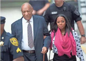  ?? MARK MAKELA, GETTY IMAGES ?? Bill Cosby arrives with actress Keshia Knight Pulliam Monday for the first day of his sexual assault trial at the Montgomery County Courthouse in Norristown, Pa.