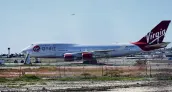  ?? PHOTO: GETTY IMAGES ?? The Virgin Orbit Boeing Co 747400. a modified