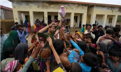  ?? Photograph: Fareed Khan/AP ?? Children at a camp for displaced people due to Cyclone Biparjoy in Badin, Pakistan's southern district in the Sindh province in June.