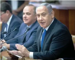  ?? (Yonatan Zindel/Flash90) ?? PRIME MINISTER Benjamin Netanyahu addresses the weekly cabinet meeting yesterday.