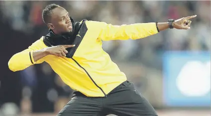  ?? Picture: Getty Images ?? POINTING TO HIS RETIREMENT. Usain Bolt bids farewell to fans after competing in his last World Championsh­ips in London on Sunday.