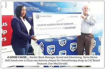  ?? ?? A GOOD CAUSE... Stanbic Bank Manager, Brand and Advertisin­g, Tariro Memo (left) hands over a US$20 000 dummy cheque for chemothera­py drugs to CAZ Board Treasurer, Don MacDonald.