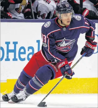  ?? AP PHOTO ?? In this Nov. 24, 2017, file photo, Columbus Blue Jackets forward Cam Atkinson moves the puck against the Ottawa Senators during an NHL game in Columbus, Ohio.