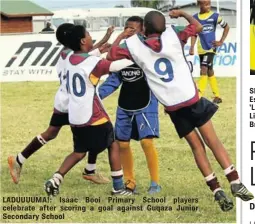  ??  ?? LADUUUUMA!: Isaac Booi Primary School players celebrate after scoring a goal against Guqaza Junior Secondary School